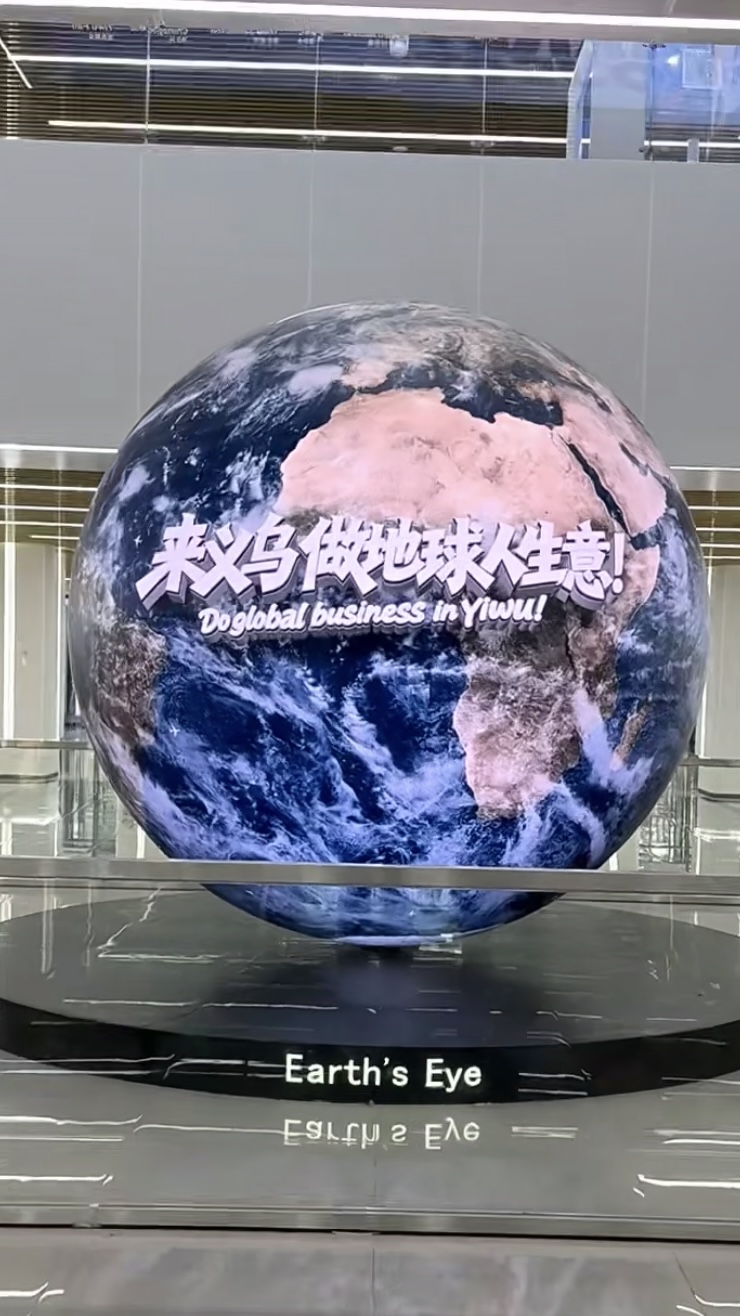 The 'Do Global Business in Yiwu' globe installation at Yiwu International Trade Market